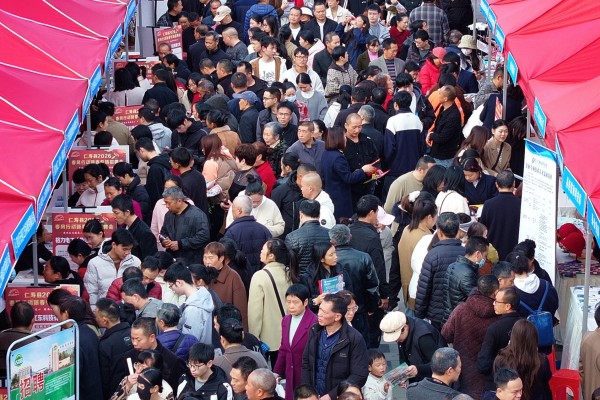 People look for employment opportunities at a job fair in Meishan, Sichuan province, last month. Photo: Xinhua