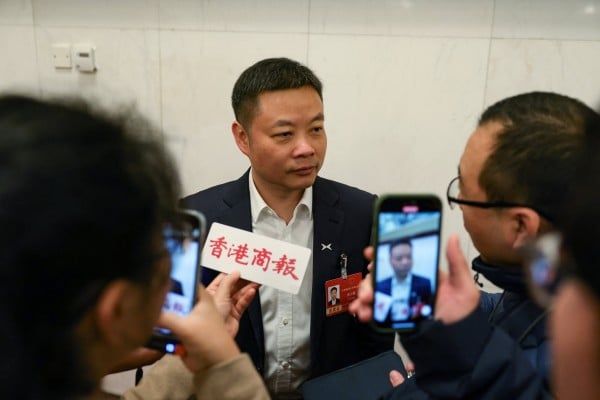He Xiaopeng, co-founder and CEO of Xpeng, speaks to members of the media before the opening session of the National People’s Congress at the Great Hall of the People in Beijing on March 5. Photo: Reuters He Xiaopeng, co-founder and CEO of Xpeng, speaks to members of the media before the opening session of the National People’s Congress at the Great Hall of the People in Beijing on March 5. Photo: Reuters