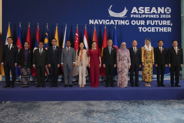 Regional ministers  pose for a group photo during the Asean Economic Ministers’ Retreat in Manila on Friday. Photo: EPA