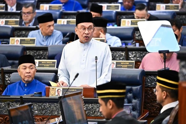 Malaysian Prime Minister Anwar Ibrahim speaks in parliament in October last year. Photo: Malaysia’s Department of Information/AFP Malaysian Prime Minister Anwar Ibrahim speaks in parliament in October last year. Photo: Malaysia’s Department of Information/AFP