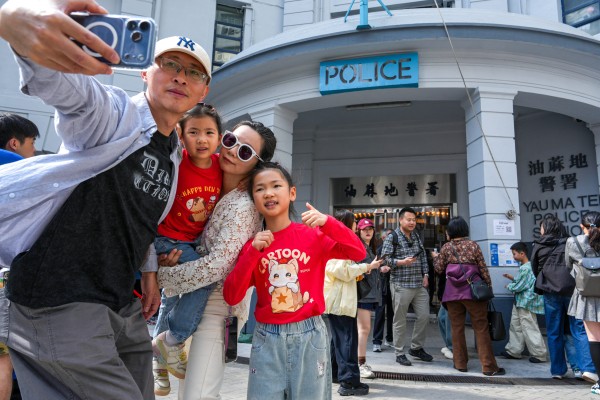 Mainland Chinese tourists visit the former Yau Ma Tei police station. Photo: Sam Tsang