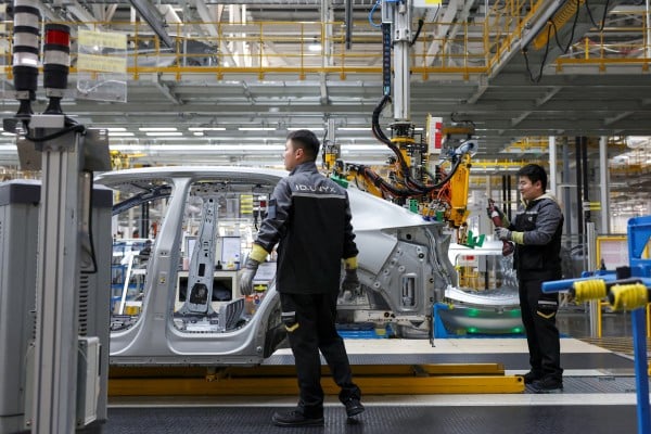 Employees work on an electric vehicle (EV) production line at the Volkswagen Anhui factory in Hefei, Anhui province, China, as the Iran war pushes up petrol prices and global EV uptake is expected to accelerate. Photo: Reuters Employees work on an electric vehicle (EV) production line at the Volkswagen Anhui factory in Hefei, Anhui province, China, as the Iran war pushes up petrol prices and global EV uptake is expected to accelerate. Photo: Reuters
