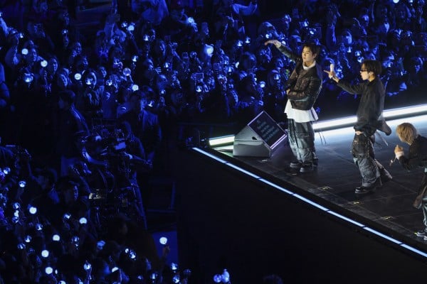 Members of K-pop group BTS perform during their comeback concert in Seoul, South Korea, on Saturday. Photo: EPA