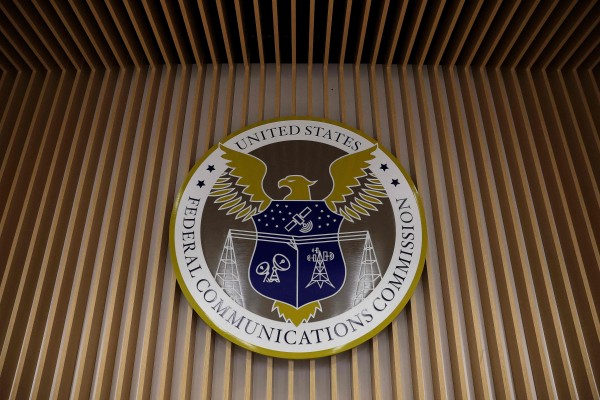 The FCC seal is seen during a meeting at its headquarters in Washington D.C. on February 18, 2026. Photo: Getty Images via AFP