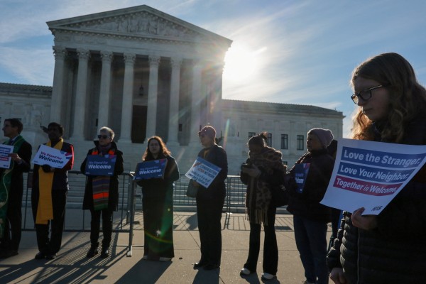 A small group led by members of the clergy gather for a vigil at the US Supreme Court building in Washington on Tuesday. Photo: Reuters A small group led by members of the clergy gather for a vigil at the US Supreme Court building in Washington on Tuesday. Photo: Reuters