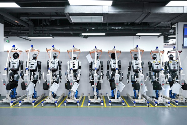 Humanoid robots at the pilot testing and validation platform at the Beijing Innovation Centre of Humanoid Robotics on March 20. Photo: AFP