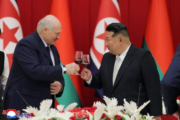 North Korean leader Kim Jong-un and Belarus’ President Alexander Lukashenko toast at a banquet in Pyongyang. Photo: KCNA via AFP North Korean leader Kim Jong-un and Belarus’ President Alexander Lukashenko toast at a banquet in Pyongyang. Photo: KCNA via AFP