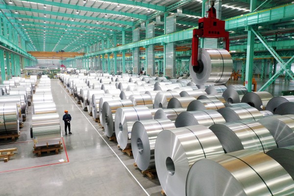 A drone view shows an employee working on the production line of aluminium products at a factory in Huaibei, Anhui province, China, in February 2025. Photo: Reuters