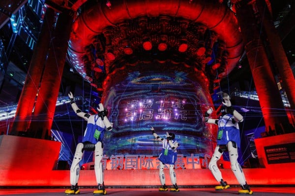 Robots perform at the China Science Fiction Convention in Beijing. The Chinese sci-fi industry saw revenues reach a record high last year, according to a report released during the event. Photo: Xinhua Robots perform at the China Science Fiction Convention in Beijing. The Chinese sci-fi industry saw revenues reach a record high last year, according to a report released during the event. Photo: Xinhua