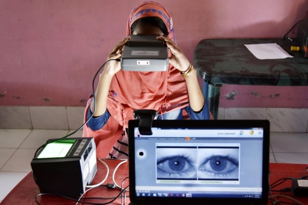 A woman takes an iris scan to link her Aadhar card with the National Register of Citizens at a passport service centre in Barpeta district in India’s north-eastern state of Assam in 2019. Without data governance mechanisms, Global South data could end up being extracted and monetised by foreign platforms for their own gains. Photo: AFP A woman takes an iris scan to link her Aadhar card with the National Register of Citizens at a passport service centre in Barpeta district in India’s north-eastern state of Assam in 2019. Without data governance mechanisms, Global South data could end up being extracted and monetised by foreign platforms for their own gains. Photo: AFP
