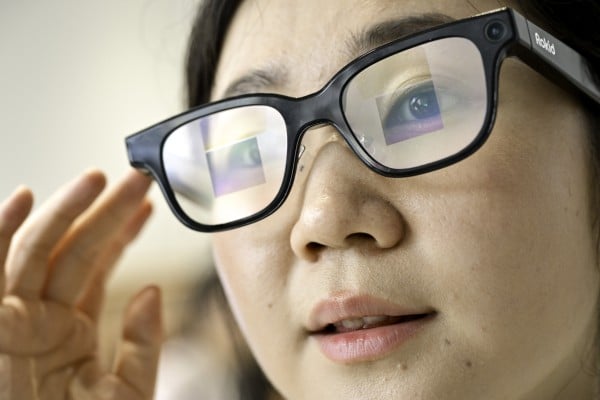 A staff member demonstrates a pair of smart glasses developed by Hangzhou-based Rokid at a store in Yingtan, in east China’s Jiangxi province, on July 10, 2025. Photo: Xinhua A staff member demonstrates a pair of smart glasses developed by Hangzhou-based Rokid at a store in Yingtan, in east China’s Jiangxi province, on July 10, 2025. Photo: Xinhua
