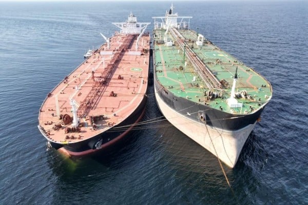 An illegal transfer of oil takes place between two tankers off Penang in December. Photo: Malaysian Maritime Enforcement Agency An illegal transfer of oil takes place between two tankers off Penang in December. Photo: Malaysian Maritime Enforcement Agency