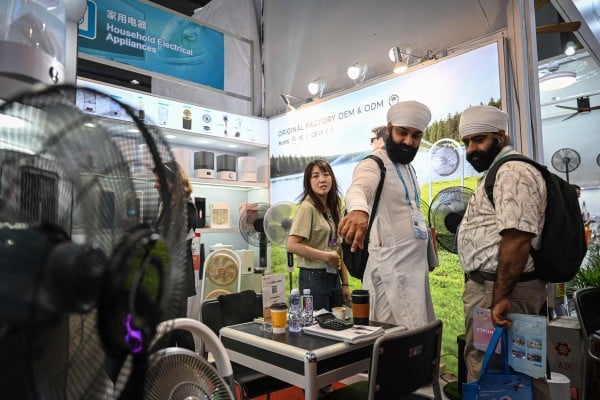 Buyers browse household electrical appliances at the 139th session of the China Import and Export Fair, also known as the Canton Fair, in Guangdong province on Wednesday. Photo: AFP Buyers browse household electrical appliances at the 139th session of the China Import and Export Fair, also known as the Canton Fair, in Guangdong province on Wednesday. Photo: AFP
