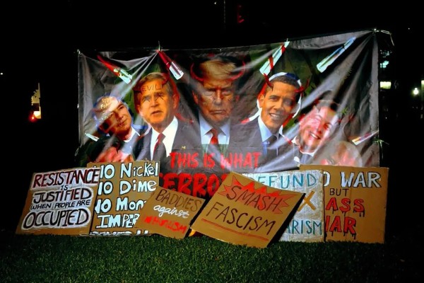 A banner at a protest in Singapore’s Hong Lim Park on Saturday shows   past and present US presidents with horns on their heads. Photo: Instagram/sgacadboycott