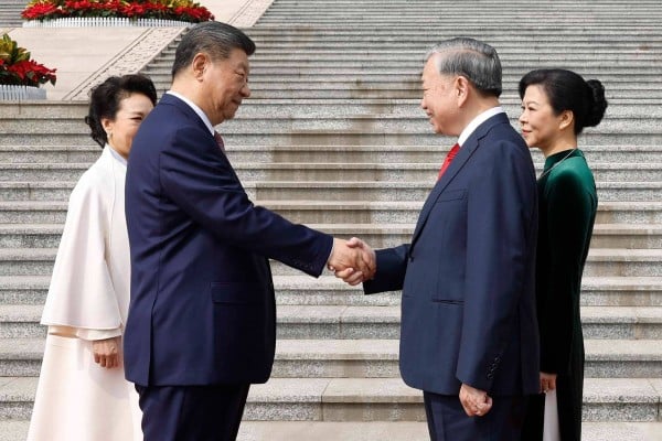 Chinese President Xi Jinping (second left) and his wife Peng Liyuan (left) welcome Vietnamese President To Lam and his wife Ngo Phuong Ly in Beijing on Wednesday. Photo: Vietnam News Agency/AFP Chinese President Xi Jinping (second left) and his wife Peng Liyuan (left) welcome Vietnamese President To Lam and his wife Ngo Phuong Ly in Beijing on Wednesday. Photo: Vietnam News Agency/AFP