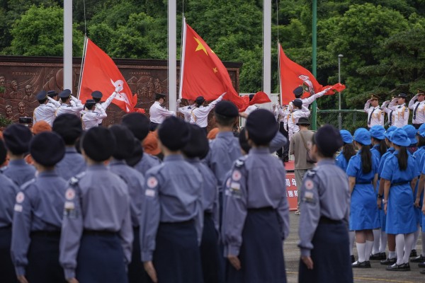 Students take part in a flag-raising ceremony in 2024. Photo: Eugene Lee