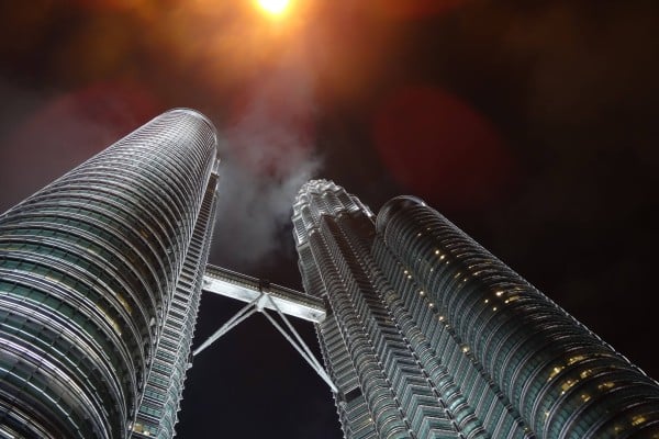 The Petronas Twin Towers in Kuala Lumpur is popular with street photographers, who offer tourists a more professional alternative to a selfie for a fee. Photo: dpa The Petronas Twin Towers in Kuala Lumpur is popular with street photographers, who offer tourists a more professional alternative to a selfie for a fee. Photo: dpa