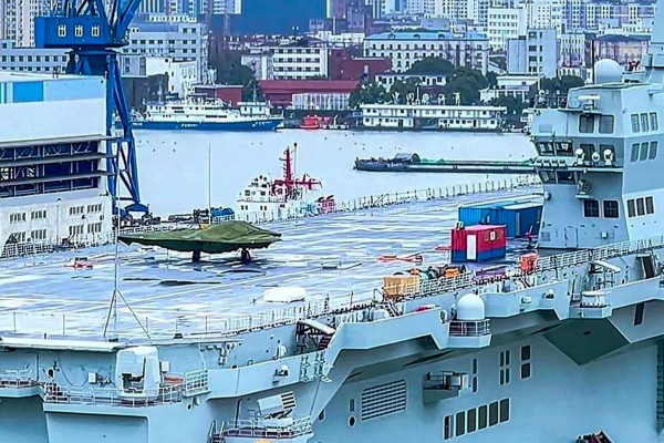 A GJ-21 stealth drone pictured on the deck of the Sichuan amphibious landing ship. Photo: Handout