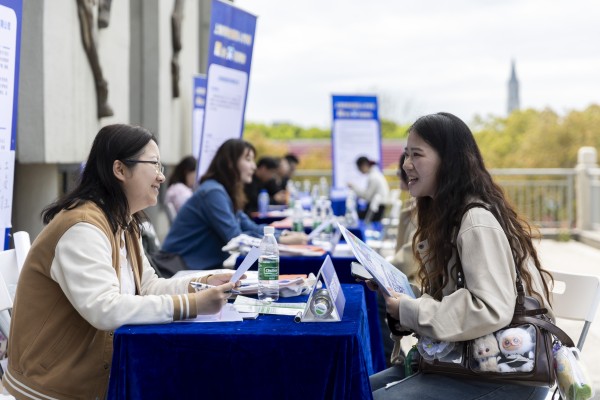 A jobseeker meets with a recruiter at a job fair in Shanghai on April 9. The job fair was for aged-care services. Nearly 50 organisations and enterprises offered more than 100 opportunities. Photo: Xinhua