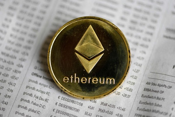 A physical imitation of an Ethereum cryptocurrency token. Photo: AFP