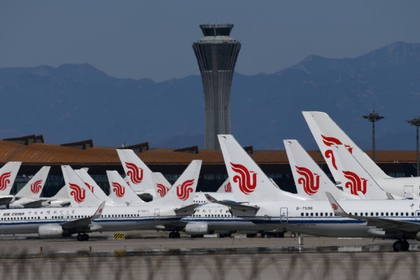 Air China planes are seen parked on the tarmac at an airport in Beijing in 2020. Photo: AFP