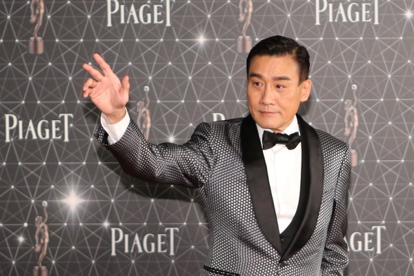 Tony Leung Ka-fai poses on the red carpet during the 35th Hong Kong Film Awards in 2016. His fifth best actor win at the HKFA cements his legendary Hong Kong cinema status. Photo: SCMP