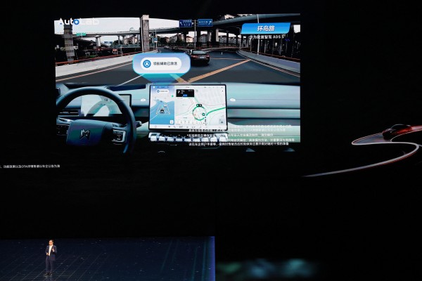 Richard Jin, CEO of Huawei’s intelligent automotive solutions business unit, introduces the company’s latest advanced driving system in Beijing on April 23, 2026. Photo: Reuters