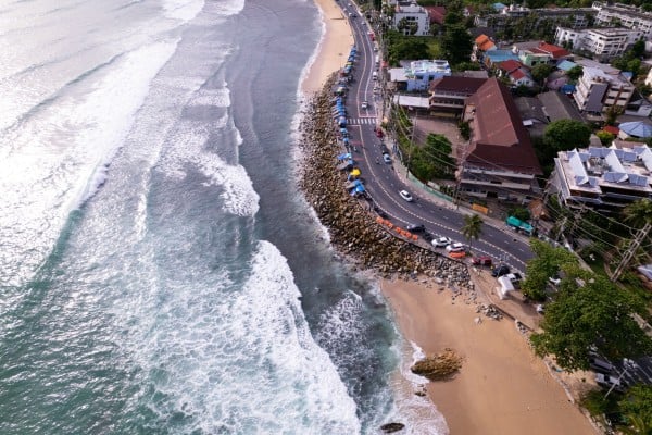 Waves crash on Kalim beach in Phuket. The suspect was arrested from a luxury resort on the Thai island. Photo: Shutterstock Waves crash on Kalim beach in Phuket. The suspect was arrested from a luxury resort on the Thai island. Photo: Shutterstock