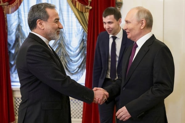 Russian President Vladimir Putin, right, meets Iran’s Foreign Minister Abbas Araghchi on Monday in St Petersburg. Photo: AP Russian President Vladimir Putin, right, meets Iran’s Foreign Minister Abbas Araghchi on Monday in St Petersburg. Photo: AP