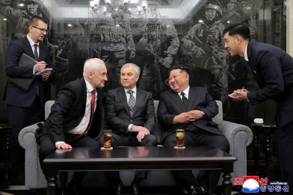 North Korean leader Kim Jong-un speaks with Russian Defence Minister Andrey Belousov (seated left) and Russian State Duma Chairman Vyacheslav Volodin in Pyongyang on April 26. Photo: KCNA via Reuters North Korean leader Kim Jong-un speaks with Russian Defence Minister Andrey Belousov (seated left) and Russian State Duma Chairman Vyacheslav Volodin in Pyongyang on April 26. Photo: KCNA via Reuters