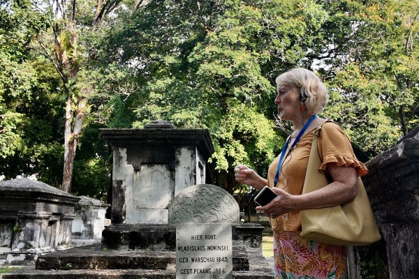 A British visitor attends a tour of the Old Protestant Cemetery in Penang, Malaysia. Photo: Ushar Daniele