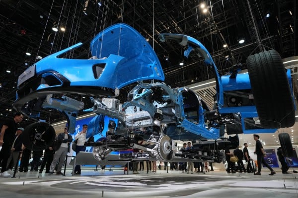 Visitors view a physical exploded model of a Xiaomi SU7 at Auto China 2026 in Beijing. Photo: AP Visitors view a physical exploded model of a Xiaomi SU7 at Auto China 2026 in Beijing. Photo: AP