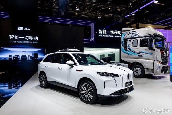 Vehicles are displayed in ZYT’s booth at the Beijing Auto Show. Photo: Weibo Vehicles are displayed in ZYT’s booth at the Beijing Auto Show. Photo: Weibo