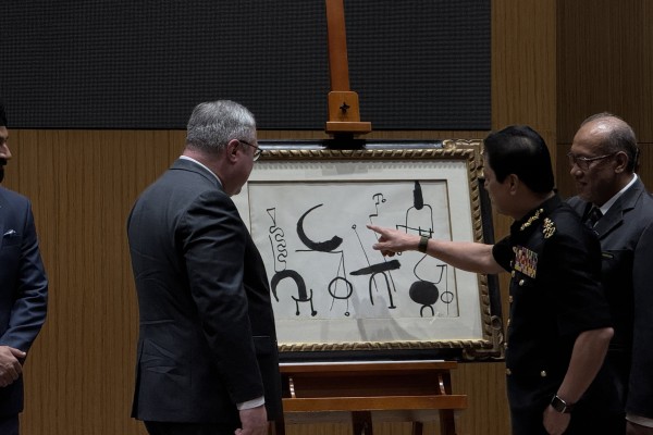 Malaysian Anti-Corruption Commission chief Azam Baki (second from right) inspects Joan Miro’s “Composition” (1953) at the MACC headquarters in Putrajaya on Wednesday. Photo: Iman Muttaqin Yusof