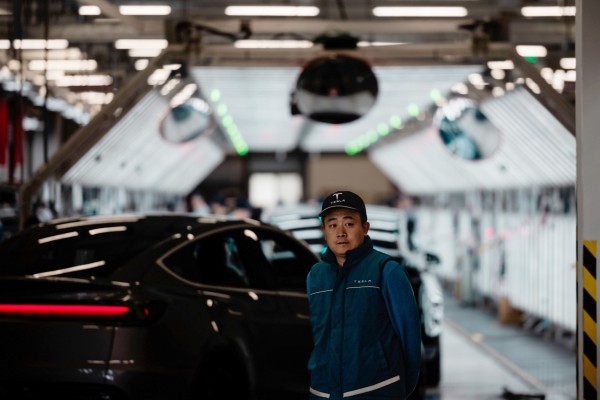 An employee works in Tesla’s Gigafactory in Shanghai on April 14. Photo: EPA