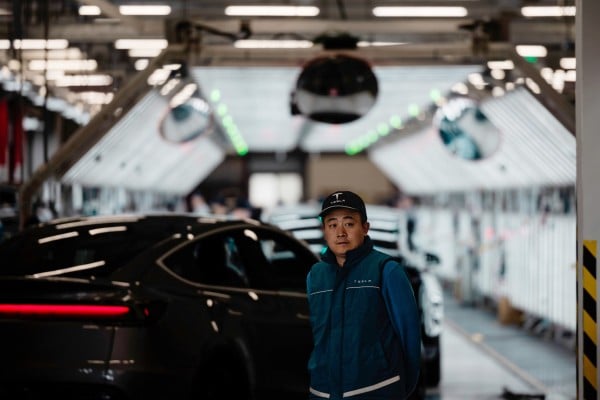 An employee works in Tesla’s Gigafactory in Shanghai on April 14. Photo: EPA An employee works in Tesla’s Gigafactory in Shanghai on April 14. Photo: EPA