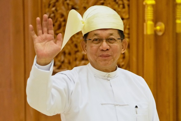 Myanmar’s newly elected President Min Aung Hlaing waves as he leaves after a swearing-in ceremony in Naypyidaw on April 10. Photo: AP Myanmar’s newly elected President Min Aung Hlaing waves as he leaves after a swearing-in ceremony in Naypyidaw on April 10. Photo: AP