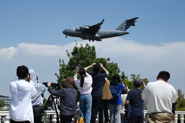 A US Air Force plane lands in Beijing ahead of a visit by President Donald Trump. Photo: AFP A US Air Force plane lands in Beijing ahead of a visit by President Donald Trump. Photo: AFP