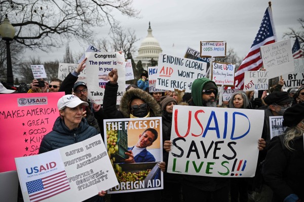 People protest in Washington in February last year against the administration of US President Donald Trump’s decision to virtually shut down the US Agency for International Development (USAID). Photo: AFP