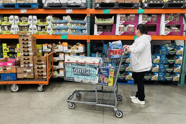 A woman shops at a Costco store in California in April 2025. Costco has promised to pass on tariff refunds to members by lowering prices. Photo: TNS A woman shops at a Costco store in California in April 2025. Costco has promised to pass on tariff refunds to members by lowering prices. Photo: TNS
