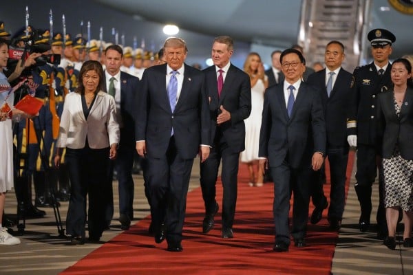 US President Donald Trump arrives in Beijing. Photo: AP US President Donald Trump arrives in Beijing. Photo: AP