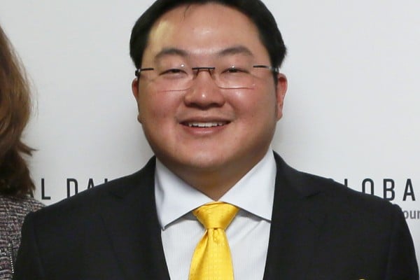 Jho Low poses at an event in Washington in April 2015. Photo: AP Jho Low poses at an event in Washington in April 2015. Photo: AP
