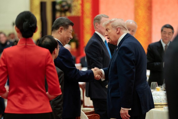 Chinese President Xi Jinping and US President Donald Trump shake hands at the state banquet. Photo: Reuters