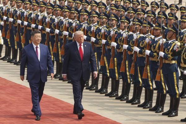 President Donald Trump participates in a welcome ceremony with China’s President Xi Jinping at the Great Hall of the People in Beijing on May 14, 2016. Photo: AP 