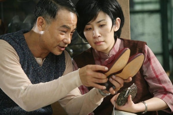 Simon Yam (left) and Sandra Ng in a still from Echoes of the Rainbow (2010). Simon Yam (left) and Sandra Ng in a still from Echoes of the Rainbow (2010).