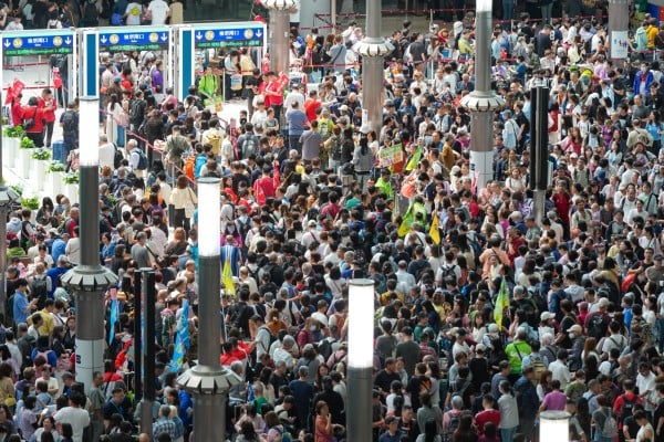 Crowds pack the West Kowloon rail terminus on the first day of the Easter break in April. Photo: Jelly Tse Crowds pack the West Kowloon rail terminus on the first day of the Easter break in April. Photo: Jelly Tse
