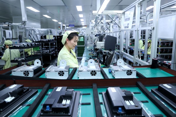 A worker produces intelligent central control navigation products at BeiDou Zhilian (Jiangsu) Technology’s factory in Suqian, Jiangsu province, last month. Photo: CFOTO/Future Publishing via Getty Images