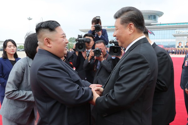North Korean leader Kim Jong-un and President Xi Jinping at Pyongyang airport in June 2019. Photo: AFP