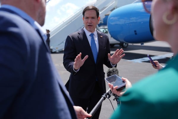 US Secretary of State Marco Rubio speaks to the media before boarding his plane at Homestead Air Base in Miami on Thursday. Photo: AP US Secretary of State Marco Rubio speaks to the media before boarding his plane at Homestead Air Base in Miami on Thursday. Photo: AP
