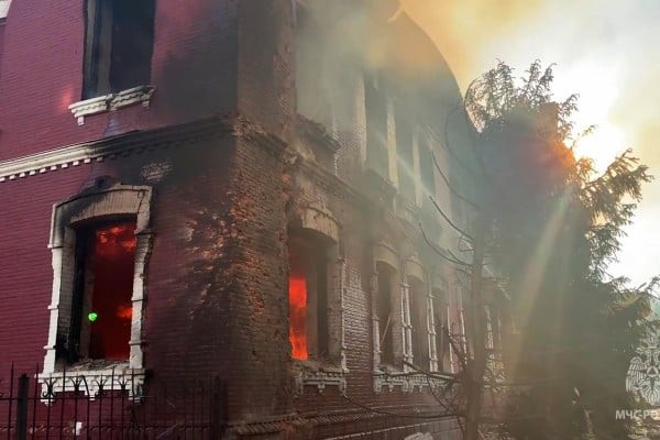 Flames and smoke rise from the side of a college building in Starobilsk, Ukraine. Photo: Russian Emergency Ministry Press Service via AP Flames and smoke rise from the side of a college building in Starobilsk, Ukraine. Photo: Russian Emergency Ministry Press Service via AP